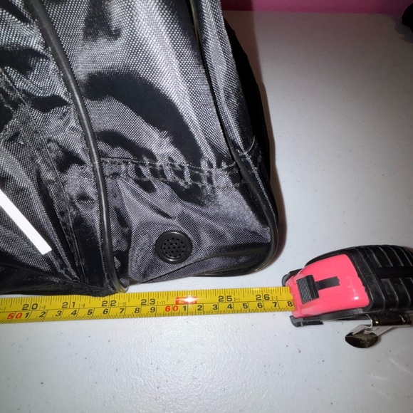 Black Duffel Bag with White Accents and Modern Design - Picture 7 of 13